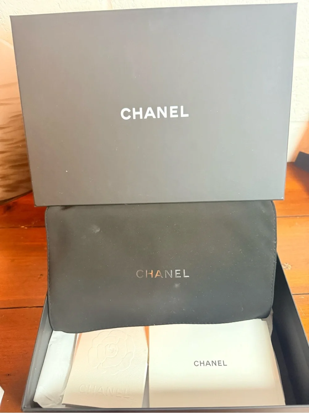 CHANEL Black Quilted Wallet with Gold CC Turn-Lock